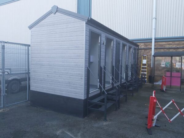 An image of Avon Direct Access Unisex Toilet Block with Service Room 6.5m x 2.4m x 3.6m Left Side Doors Open